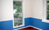 Install window picture frame and chair rail in dining room with the finish of a two color paint job.